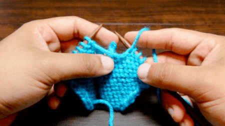 Example of a dropped purl stitch