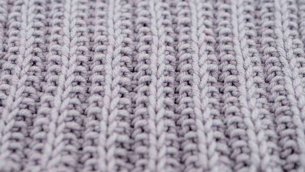 Close Up of Cartridge Belt Rib Stitch Knitting Pattern