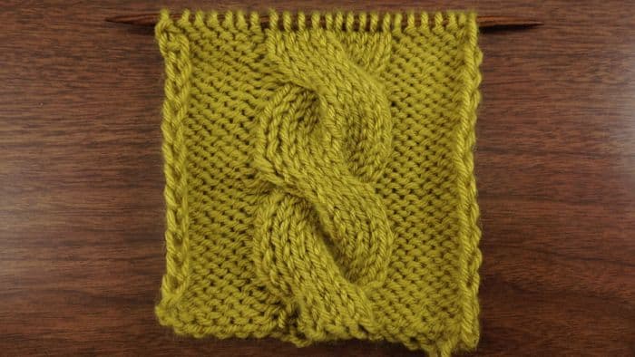Example of the Chunky Cable Stitch on a reverse stockinette background
